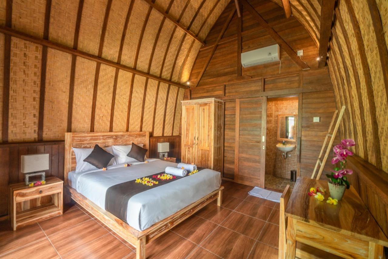 Wooden Puri Guesthouse Uluwatu Extérieur photo