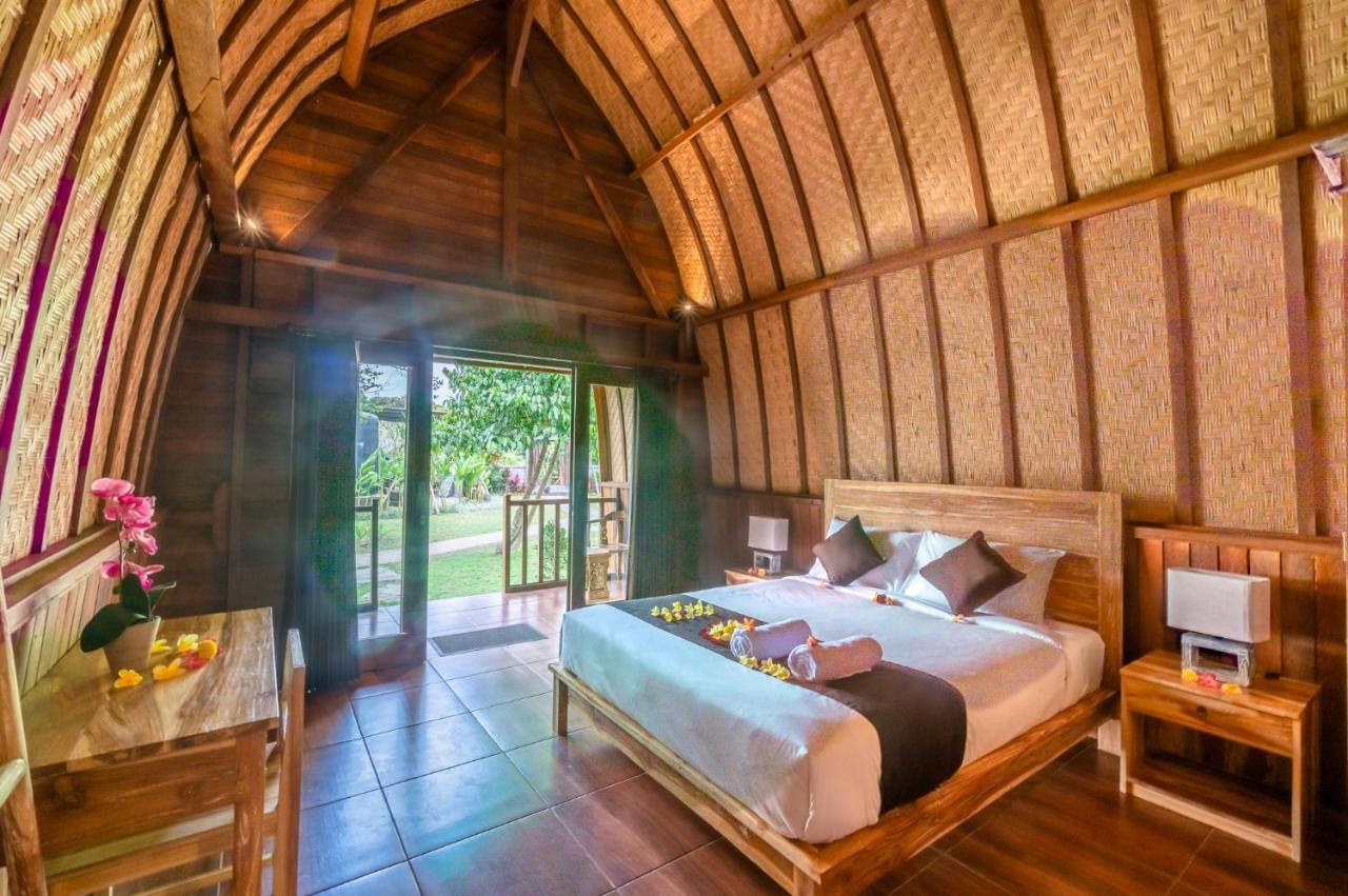 Wooden Puri Guesthouse Uluwatu Extérieur photo