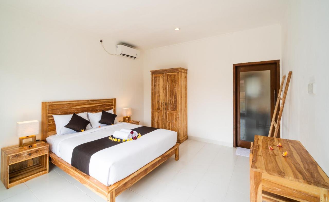 Wooden Puri Guesthouse Uluwatu Extérieur photo