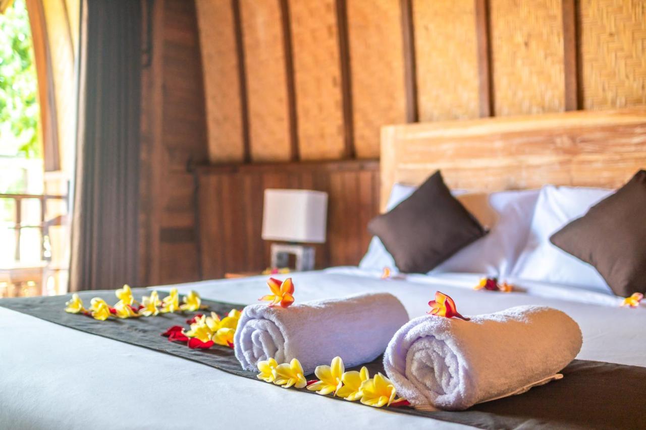 Wooden Puri Guesthouse Uluwatu Extérieur photo