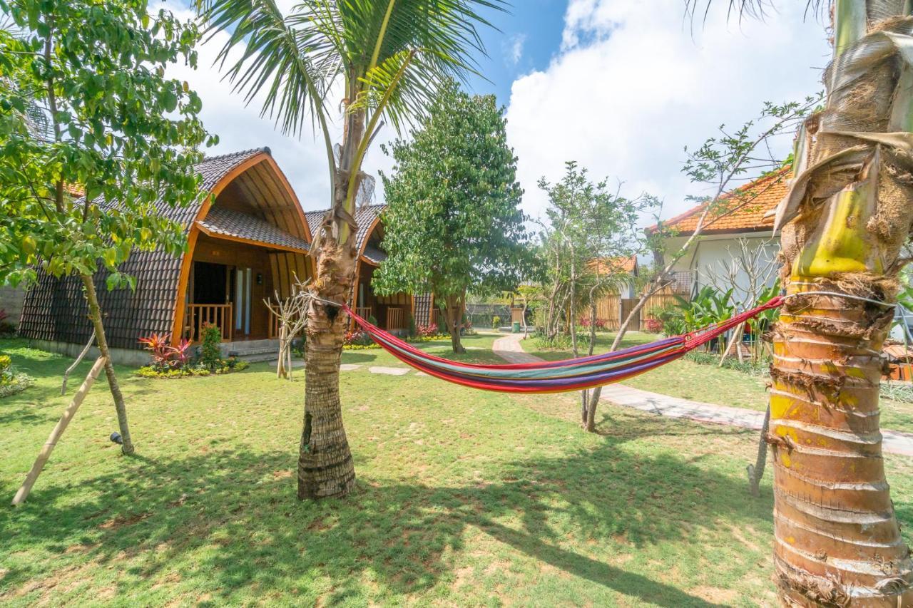 Wooden Puri Guesthouse Uluwatu Extérieur photo